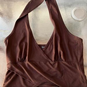 brown haltered shirt.